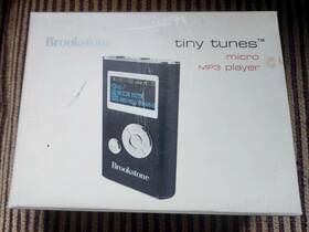 Brookstone 400005301476 Tiny Tunes - Micro Mp3 Player Black Brand New