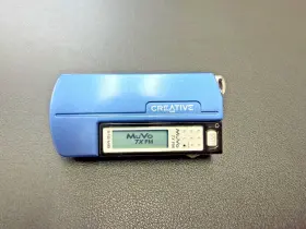 Muvotx512 Creative Muvo Tx Fm 512mb Mp3 Player Blue With Strap And Sleeve - Tested