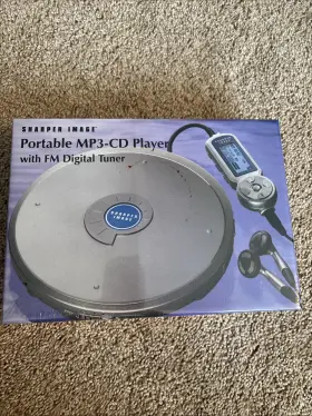 Mp3-cd Sharper Image Cx603 Portable Player With Fm Digital Tuner - Brand New
