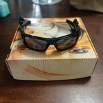 Oakley Thump MP3 Polished Black/black Iridium 512MB Music Player 05-165-A16708 Used. Price: $300.00.