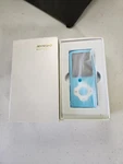 Mymahdi Digital MP3 Music Player Model M230, Input DC5V-1A Slim 3.5"X 2" Blue Open. Price: $19.99.