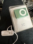 Apple Ipod Shuffle 2ND Generation A1204 1GB W/ Oem Charging Dock Used. Price: $39.90.