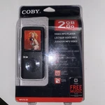 Coby 2GB Go Video MP3 Player Hours Of 1000 Songs MP610-2G New Sealed. Price: $19.95.