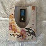 New Sandisk Sansa Express Gb MP3 Player Black (SDMX7-2048-A18). Price: $70.00.