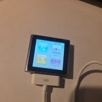 Apple Ipod Nano 6TH Generation 16GB Graphite With Music Used. Price: $50.00.