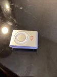 Apple Ipod Shuffle 2ND Gen. (5C703LJRXQS) 1GB Grey A1204 Used. Price: $25.00.