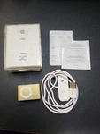 Apple Ipod Shuffle 2ND Generation Gold (1 Gb) Used. Price: $50.00.
