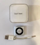 Apple Ipod Shuffle 4TH Generation Silver (2GB) Excellent Condition With Box Used. Price: $69.99.