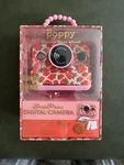 Xo Poppy Instaprint Digital Camera 1080P Video, Instant Thermal Printing New. Price: $60.00.