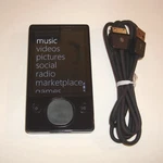 Microsoft Zune Black (120 Gb) Digital Media Player With Charger Used. Price: $179.99.
