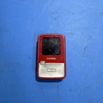 Sandisk Sansa MP3 Player Red For Parts / Not Working. Price: $20.00.
