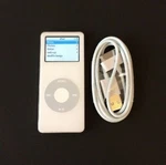Apple Ipod Nano 1ST Generation White (2 Gb) MA004LL - Good Condition Used. Price: $39.99.
