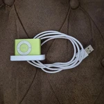 Apple Ipod Shuffle 2ND Gen Usb Charging Dock Cradle - Green/white Used. Price: $60.00.