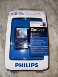 New Philips Gogear SA3025 2GB Digital Audio/video Player. Sealed Blue. Price: $24.00.