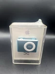 Apple Ipod Shuffle 1GB Blue A1204 Factory Sealed New In Box. Price: $49.99.