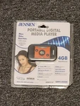 Brand New Sealed Jensen SMPV-4GBEB Digital Media Player Open. Price: $20.99.