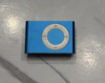 Apple Ipod Shuffle 2ND Generation Blue (1 Gb) Works Great Used. Price: $17.99.