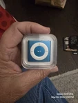 Never Used New Apple Ipod Shuffle 2GB Blue 4TH Gen Usb MP3 Player MD775LL/A. Price: $100.00.