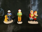 Dept. 56 Snow Village "here We Come Caroling" #5161-6 New. Price: $22.99.
