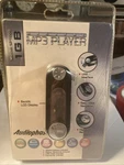 Audiophase Digital MP3 Player Gb / Model KP1000 New In Opened Package. Price: $15.00.