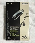 Sony NW-E405 Walkman MP3 Player 512MB Flash Memory Rose (fully Working) Used. Price: $350.00.