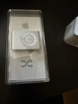 Apple Ipod Shuffle 1GB Silver A1204 PA564LL/A Sealed Container New. Price: $75.00.