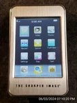 The Sharper Image Touch MP4 Player New. Price: $24.99.