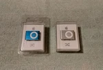 Factory Sealed Apple Ipod Shuffles Model A1204 2GB Silver And Blue New. Price: $149.99.