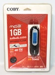 Coby MP3 Audio Player 1GB Black White Usb 2.0 Plug & MP-C885, New, Sealed. Price: $24.95.