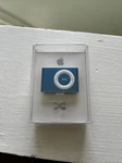 Apple Ipod Shuffle 2ND Generation Blue 1GB A1204 - MB814LL/A W/ Dock Sealed New. Price: $150.00.