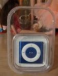 Apple Ipod PC751LL/A Shuffle 4TH Generation - Blue (2GB) New Sealed In Box. Price: $95.00.