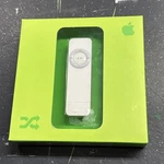 Apple Ipod Shuffle 1ST Generation White Pc + Mac 240 Songs Gb M9725LL/A New. Price: $132.05.