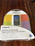 New Polaroid Portable Multimedia Player W/ 2.2" Lcd Screen. Price: $30.00.
