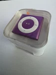 New Apple Ipod Shuffle 2GB 4TH Generation - Purple MD777LL/A ** In Box. Price: $145.00.