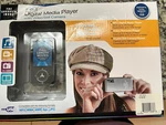 Sharper Image 4 In 1 Digital Media Player With Video/still Camera MP3 Memory 5GB New. Price: $45.00.