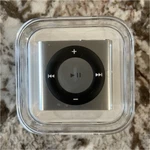 Apple Ipod Shuffle 4TH Gen 2GB Silver Usb 2.0 MP3/AAC PC584LL/A Factory Sealed New. Price: $99.00.