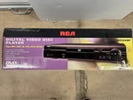 New In Box - Rca Digital Video Disc Player RC5240P Open. Price: $50.00.