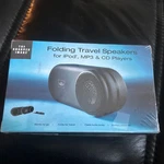 The Sharper Image Folding Travel Speakers Dvd & Cd Players Factory Sealed New. Price: $11.95.