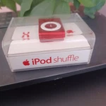 Apple Ipod Shuffle 2GB Red Edition (model MB779LL/A) Open. Price: $65.00.