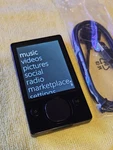 Microsoft Zune Black (120 Gb) Digital Media Player With New Battery Used. Price: $229.94.