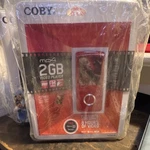 Coby MP705-2G 2GB MP4 Player Red Fm Tuner Touchpad Usb 2.0 2IN Screen New. Price: $45.00.