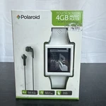 New Polaroid Touch Screen 4GB Music Player PMP76BGL 2013 White. Price: $34.95.