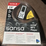 Sandisk Sansa M250 MP3 Music Player 2GB Black (factory Sealed) New. Price: $94.99.