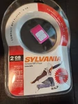 Sylvania SMP2012 2GB Compact MP3 Player W/accessories Pink New Sealed - B2A. Price: $15.00.
