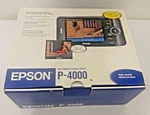 Epson P4000 Multimedia Storage Viewer - 80GB Hard Drive Stand & Extra Battery Used. Price: $52.00.