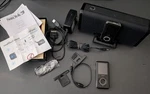 Sandisk Sansa MP3 Lot E260 & E250R - (inmotion Portable Speaker For Parts) Used. Price: $35.00.