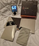Microsoft Zune 30GB White 1ST Gen Media Player MP3 Usb 2.0 Headphone Jack Used. Price: $120.00.