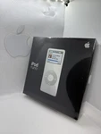 Apple Ipod Nano 1ST Generation 4GB White New Sealed. Price: $731.40.