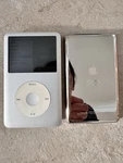 Apple Ipod Classic 7TH Generation 160GB Silver MC293J MC293LL New Battery Used. Price: $225.00.