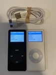 Lot Of Apple Ipod Nano 1ST Generation Black (1 Gb) And White (2 Lcd Spots Used. Price: $29.99.